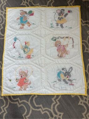 Baby quilt….made by hand.